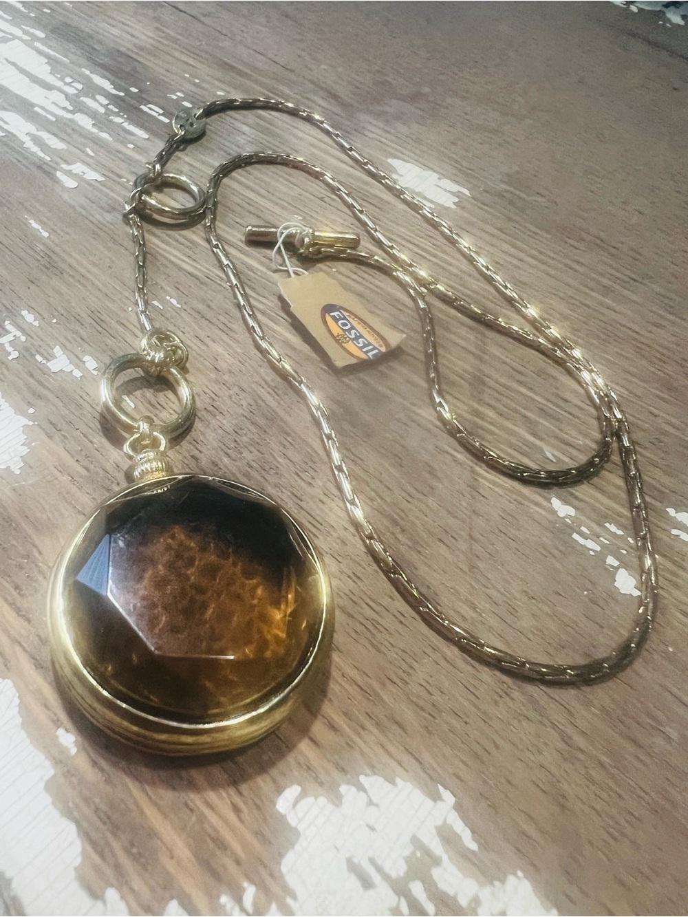 Vintage Fossil amber-brown glass stone and a pocket-watch-inspired necklace